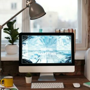 Silver Imac on Brown Wooden Table